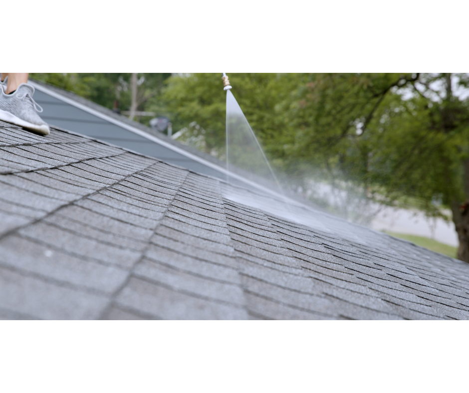 Technician applying GreenSoy rejuvenation across aged asphalt shingles